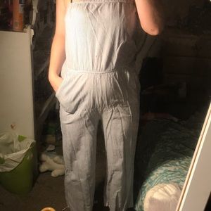 a striped jump suit